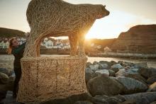 Polar Bear willow sculpture in Staithes by Emma Stothard